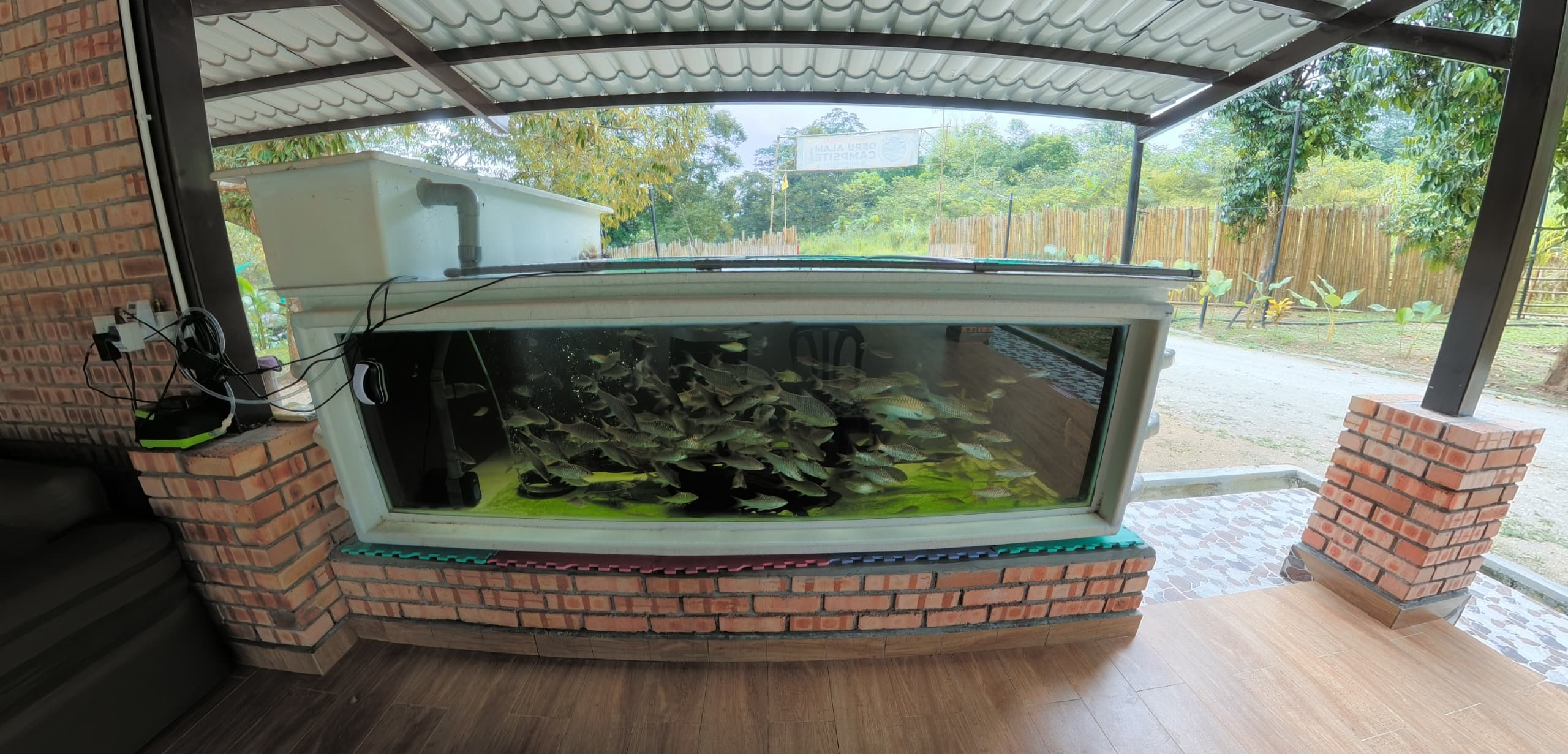 Large fish tank at the edge of the hall